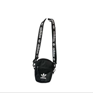 Adidas Crossbody Bag with two zipper compartments.